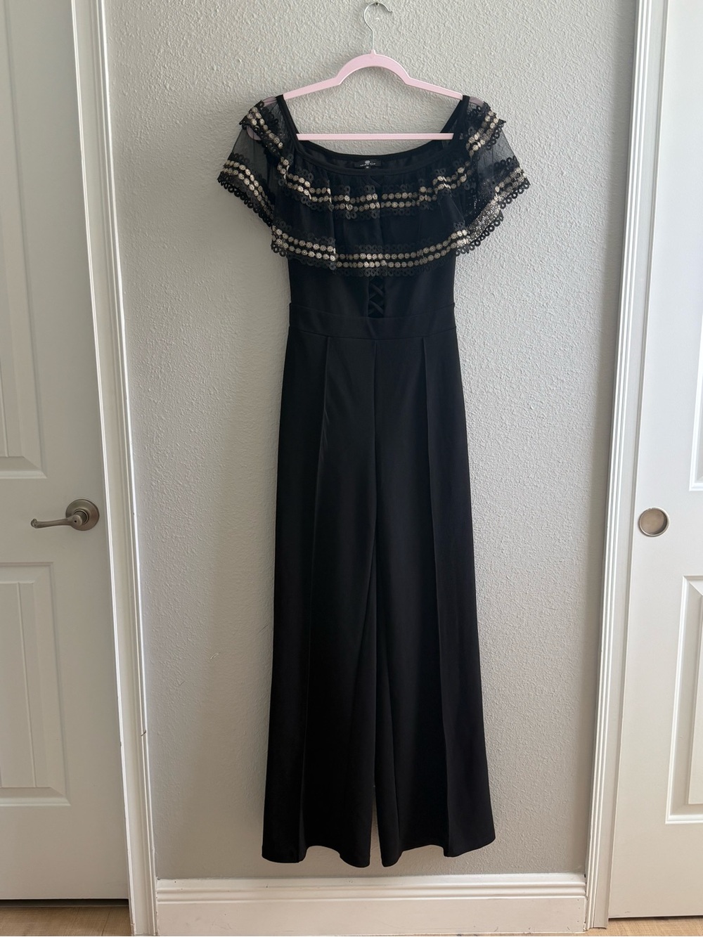 Elegant Black Off-Shoulder Wide-Leg Jumpsuit with Ruffle